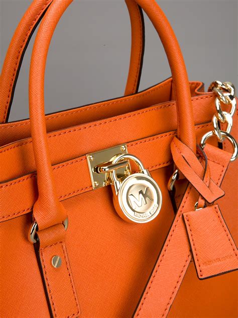 michael kors fringe purse|michael kors orange top.